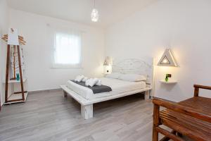 Postel nebo postele na pokoji v ubytování Camere Tirreno 1