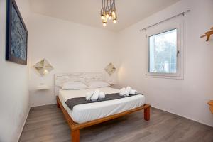 Postel nebo postele na pokoji v ubytování Camere Tirreno 1