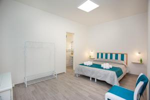 Postel nebo postele na pokoji v ubytování Camere Tirreno 1 + 29 fotografií