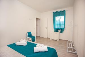 Postel nebo postele na pokoji v ubytování Camere Tirreno 1