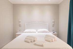 Ένα ή περισσότερα κρεβάτια σε δωμάτιο στο Domu Ajaju Guest House