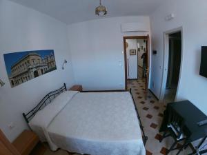 Postel nebo postele na pokoji v ubytování Casa NILLA