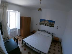 Postel nebo postele na pokoji v ubytování Casa NILLA