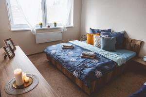 A bed or beds in a room at Apartmán Zara