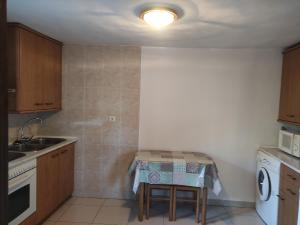 A kitchen or kitchenette at Apartamento Miguel Torla Ordesa Még 6 kép