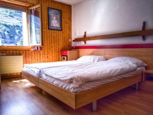 Postel nebo postele na pokoji v ubytování Hotel du Stand