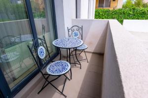 Un balcon sau o terasă la Chic Eva n