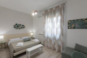 Кровать или кровати в номере B&B Bella Vista