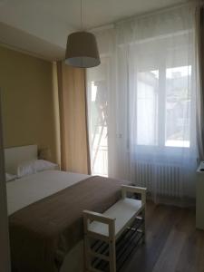 Кровать или кровати в номере CASA DE MAR