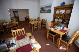 an overhead view of a dining room with tables and chairs at Claremont Guesthouse in Hunstanton