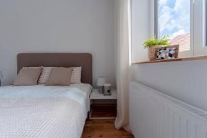 Voodi või voodid majutusasutuse Perfektes Appartement für Erholung in der Wachau!! toas