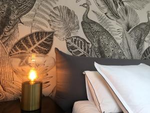 Posteľ alebo postele v izbe v ubytovaní VILLA DE LA LUZ Luxury Guesthouse