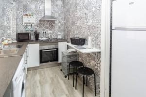 Η κουζίνα ή μικρή κουζίνα στο Pablo Neruda Tourist Home