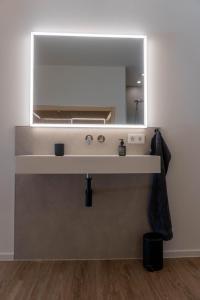 Ένα μπάνιο στο Velo & Wohnen -NEU- Elektroräder inklusive - Sauna
