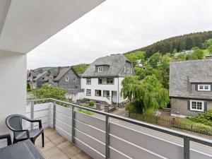 a view from the balcony of a house at Beautiful Holiday Home in Winterberg near Ski Slopes in Winterberg