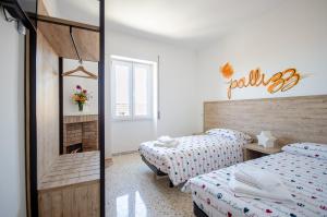 Voodi või voodid majutusasutuse Girastrittue Colobraro toas