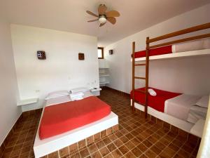 Postel nebo postele na pokoji v ubytování Hotel Casa Vichayo