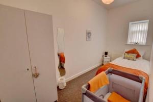 Säng eller sängar i ett rum på Pomfret House, in Burnley Central, Ideal for Contractors with Free Parking and Wifi