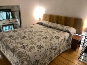 Postel nebo postele na pokoji v ubytování Affittacamere Monterosso 5 Terre