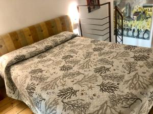 Postel nebo postele na pokoji v ubytování Affittacamere Monterosso 5 Terre