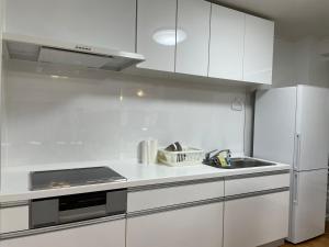 Kuchyň nebo kuchyňský kout v ubytování JAM ClubHouse Resort