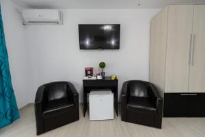 TV a/nebo společenská místnost v ubytování Irish Residence