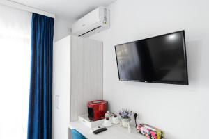 TV a/nebo společenská místnost v ubytování Irish Residence