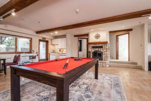 a kitchen with a pool table in a room at Beach Villa Home - Walk to Beaches Trails Restaurants Activities & more in Half Moon Bay