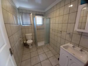 Ένα μπάνιο στο Goldfields Gardens Guesthouse