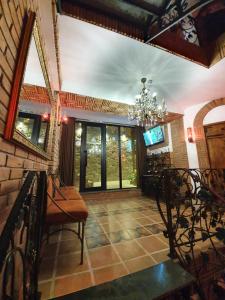 A television and/or entertainment centre at Janashia Boutique Hotels