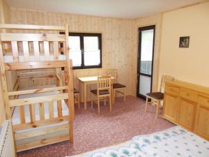 Ένα ή περισσότερα κρεβάτια σε δωμάτιο στο pension TARA