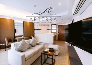 TV a/nebo společenská místnost v ubytování Arterra Hotel and Resort