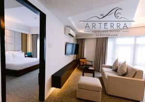 TV a/nebo společenská místnost v ubytování Arterra Hotel and Resort