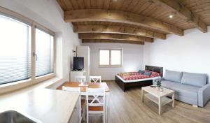 A seating area at Apartmány pod horou
