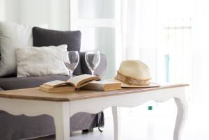 Posezení v ubytování Edone' by PortofinoHomes