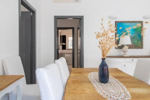 Posezení v ubytování Edone' by PortofinoHomes