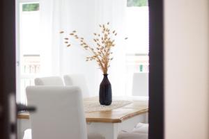 Posezení v ubytování Edone' by PortofinoHomes