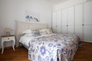 Postel nebo postele na pokoji v ubytování Edone' by PortofinoHomes