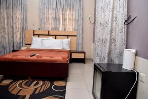 Llit o llits en una habitació de Koraf Hotels