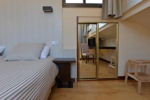 Postel nebo postele na pokoji v ubytování Hostal Concejo