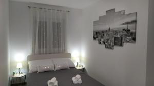 Postel nebo postele na pokoji v ubytování Urban Apartment Vukić