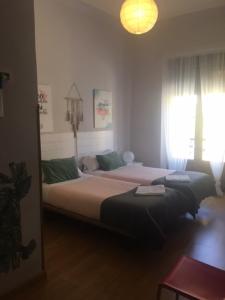 Hotel Covadonga tesisinde bir odada yatak veya yataklar