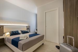 Letto o letti in una camera di Scrusciu du mari