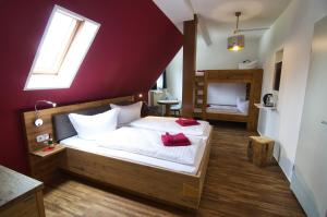 Postel nebo postele na pokoji v ubytování Berghotel Bärenstein