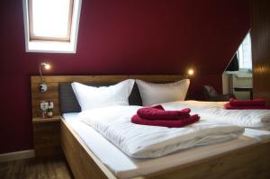 Postel nebo postele na pokoji v ubytování Berghotel Bärenstein