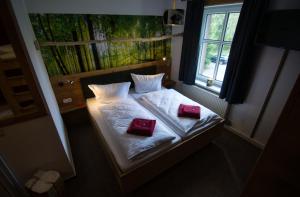 Postel nebo postele na pokoji v ubytování Berghotel Bärenstein