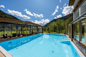 Bazén v ubytování Genusshotel Almrausch nebo v jeho okolí