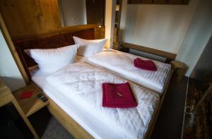 Postel nebo postele na pokoji v ubytování Berghotel Bärenstein