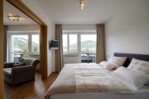 Letto o letti in una camera di Hotel Berghof