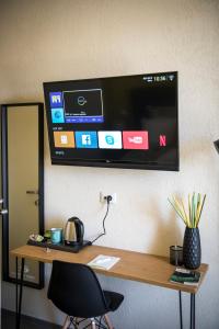 TV a/nebo společenská místnost v ubytování B&B SMARTFIT HOUSE - Room & Relax in Pescara